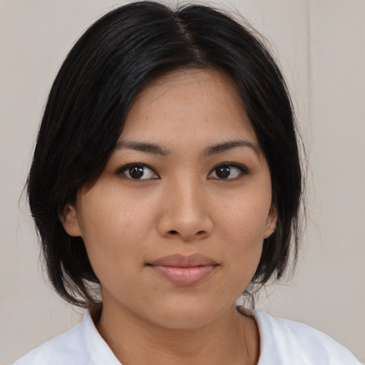Neutral asian young-adult female with medium  black hair and brown eyes
