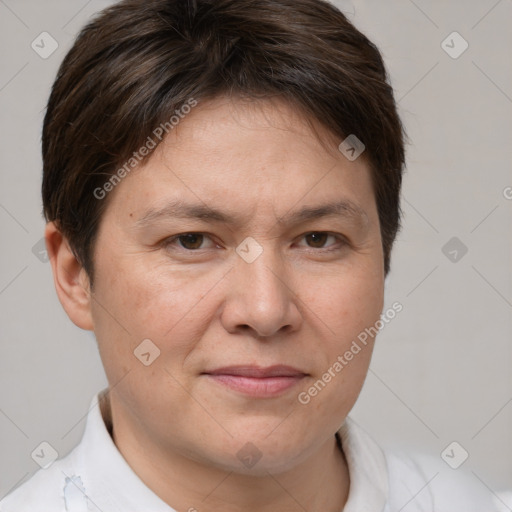 Joyful white adult female with short  brown hair and brown eyes