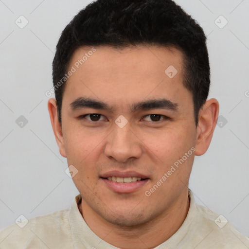 Joyful white young-adult male with short  black hair and brown eyes