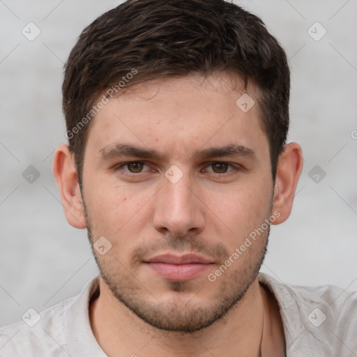 Neutral white young-adult male with short  brown hair and brown eyes