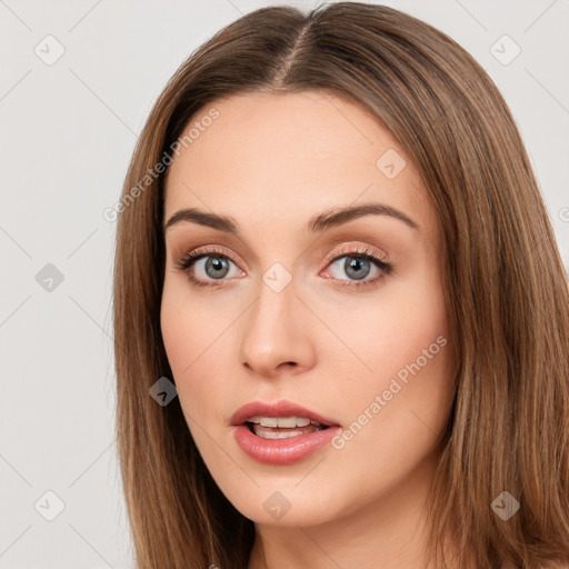 Neutral white young-adult female with long  brown hair and brown eyes