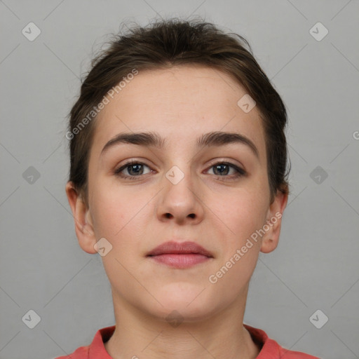 Neutral white young-adult female with short  brown hair and brown eyes