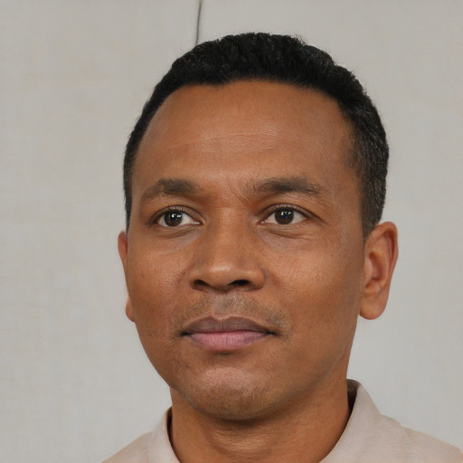 Neutral black adult male with short  black hair and brown eyes