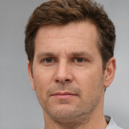 Neutral white adult male with short  brown hair and brown eyes