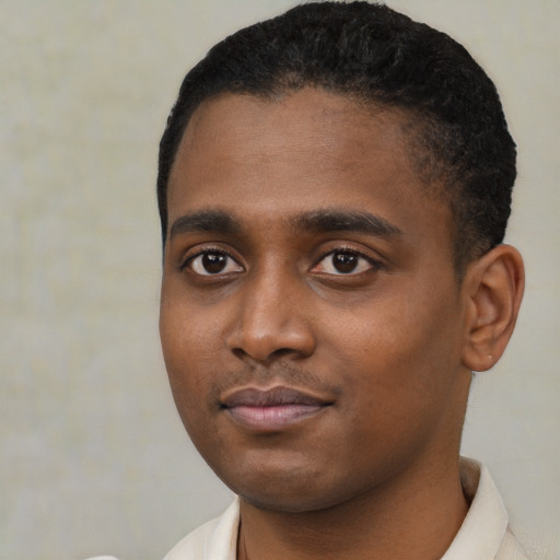 Neutral black young-adult male with short  black hair and brown eyes