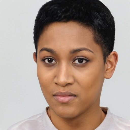 Joyful latino young-adult female with short  black hair and brown eyes