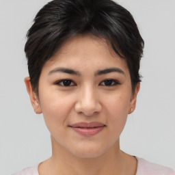 Joyful asian young-adult female with short  brown hair and brown eyes