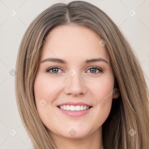 Joyful white young-adult female with long  brown hair and green eyes