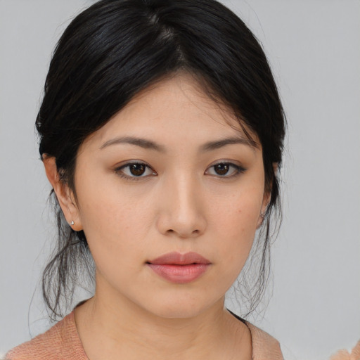 Neutral asian young-adult female with medium  black hair and brown eyes