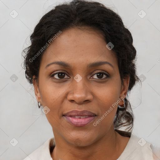 Joyful black adult female with short  brown hair and brown eyes