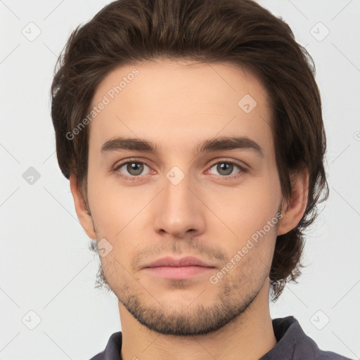 Neutral white young-adult male with short  brown hair and brown eyes