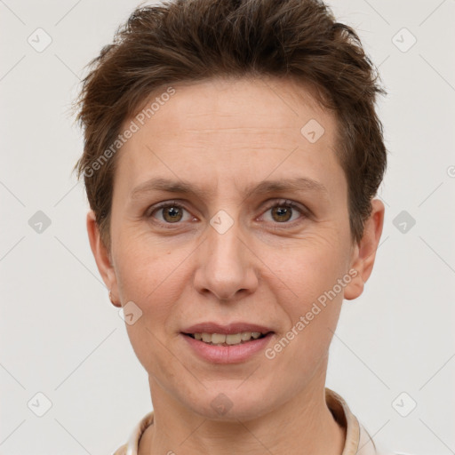 Joyful white adult female with short  brown hair and brown eyes