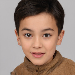 Joyful white child female with short  brown hair and brown eyes