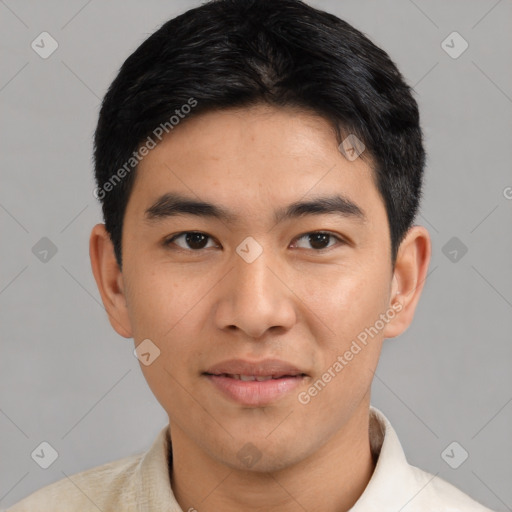 Joyful asian young-adult male with short  black hair and brown eyes