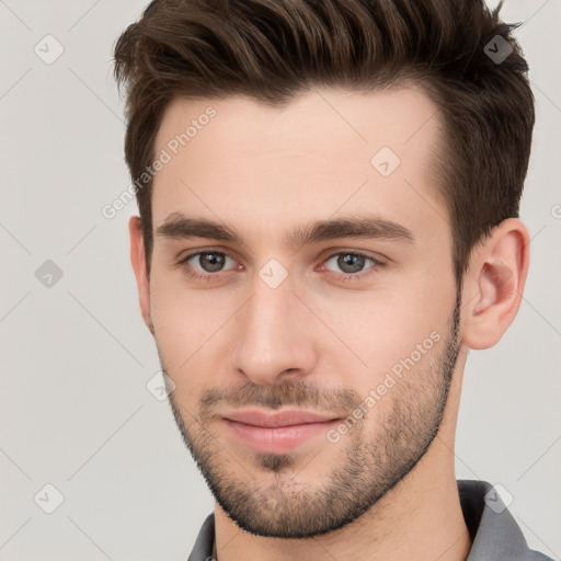 Neutral white young-adult male with short  brown hair and brown eyes