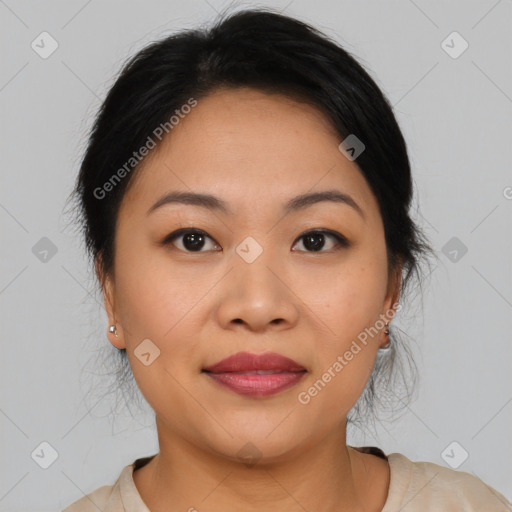 Joyful asian young-adult female with medium  brown hair and brown eyes