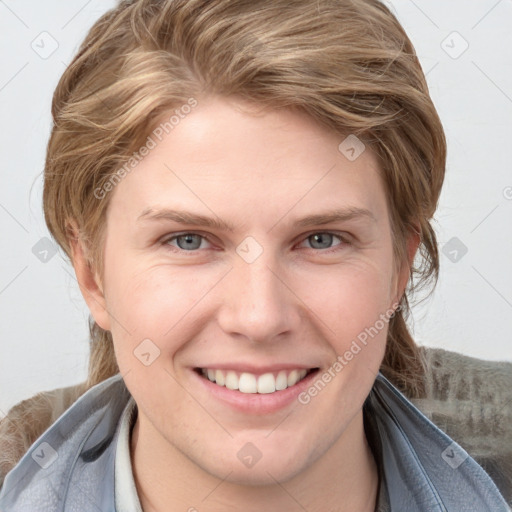 Joyful white young-adult female with medium  brown hair and blue eyes