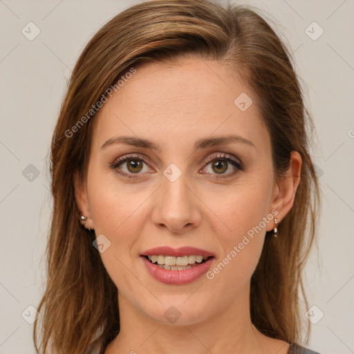 Joyful white young-adult female with medium  brown hair and green eyes