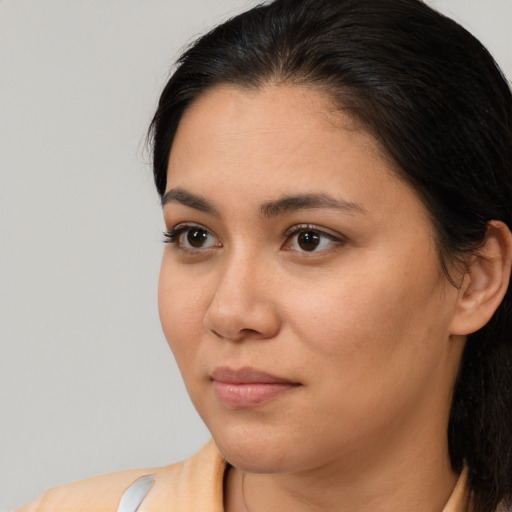 Neutral white young-adult female with medium  brown hair and brown eyes