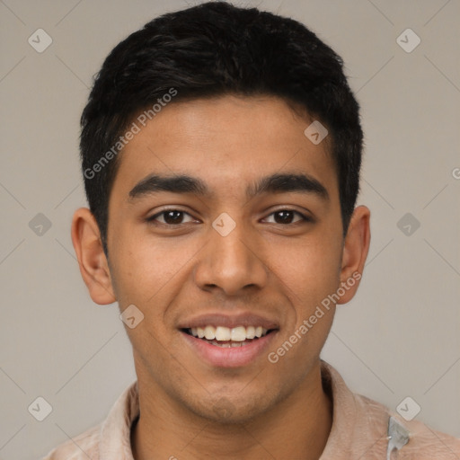 Joyful latino young-adult male with short  brown hair and brown eyes