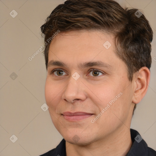 Joyful white adult male with short  brown hair and brown eyes