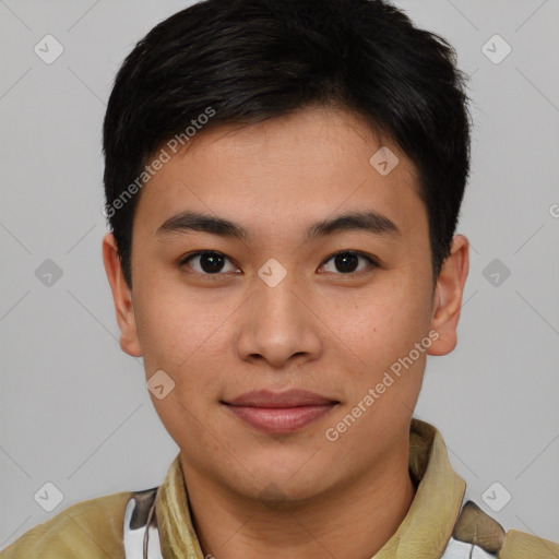 Joyful asian young-adult male with short  brown hair and brown eyes