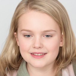 Joyful white child female with medium  brown hair and blue eyes