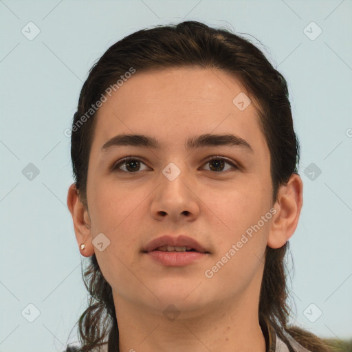 Neutral white young-adult female with short  brown hair and brown eyes