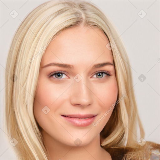 Joyful white young-adult female with long  brown hair and blue eyes