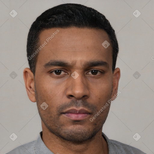 Neutral latino young-adult male with short  black hair and brown eyes
