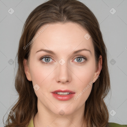 Joyful white young-adult female with medium  brown hair and green eyes