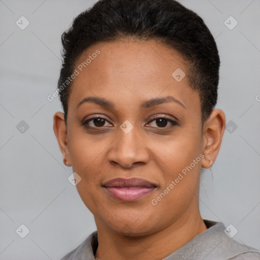 Joyful black adult female with short  brown hair and brown eyes