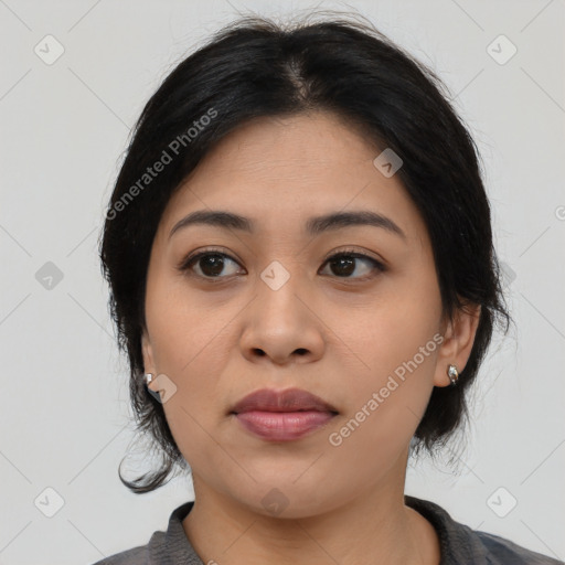 Joyful asian young-adult female with medium  black hair and brown eyes