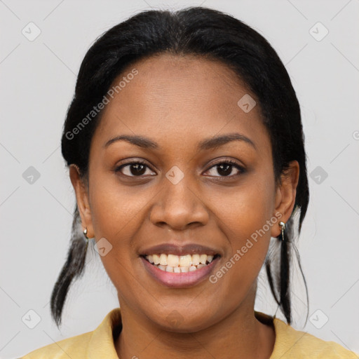 Joyful black young-adult female with medium  black hair and brown eyes