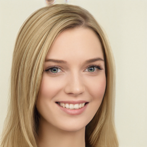 Joyful white young-adult female with long  brown hair and green eyes