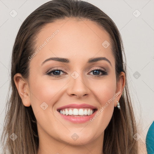 Joyful white young-adult female with long  brown hair and grey eyes