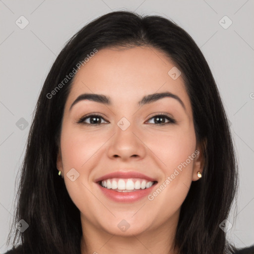 Joyful white young-adult female with long  black hair and brown eyes