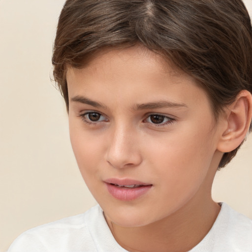 Joyful white child female with short  brown hair and brown eyes