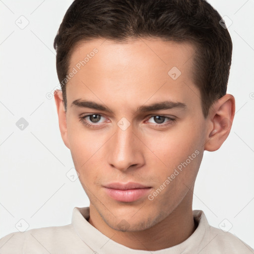 Neutral white young-adult male with short  brown hair and brown eyes