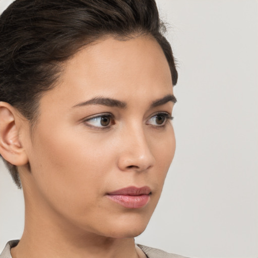 Neutral white young-adult female with short  brown hair and brown eyes