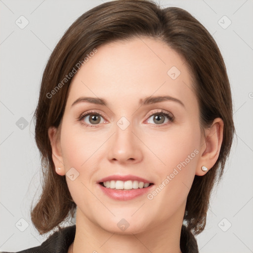 Joyful white young-adult female with medium  brown hair and green eyes