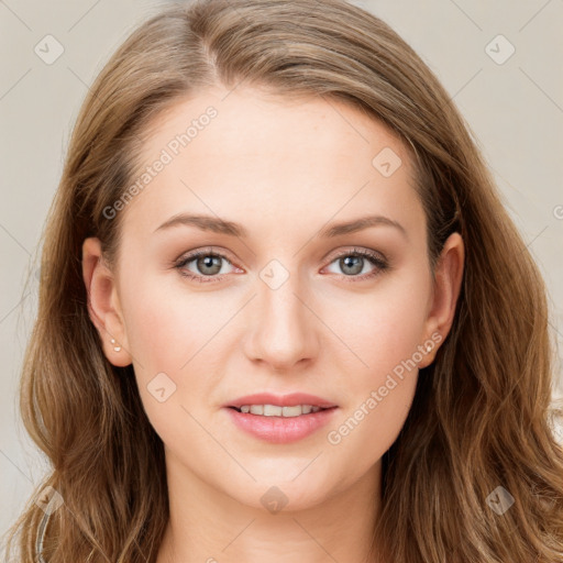 Joyful white young-adult female with long  brown hair and blue eyes