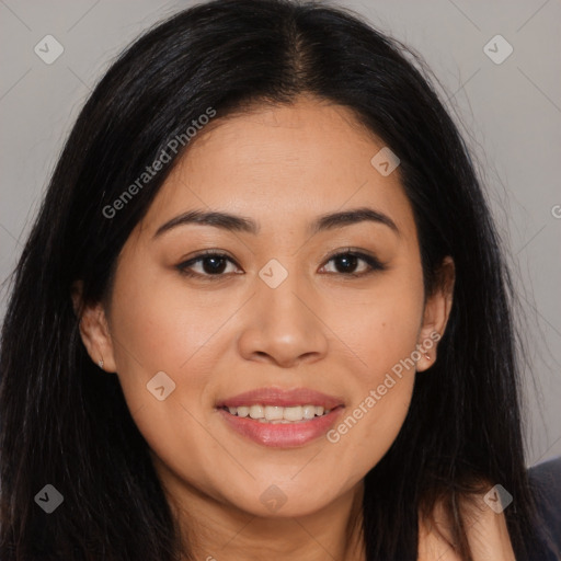 Joyful latino young-adult female with long  brown hair and brown eyes