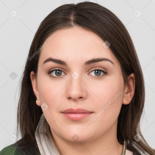 Neutral white young-adult female with medium  brown hair and grey eyes