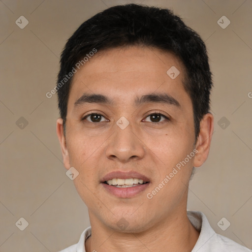 Joyful white young-adult male with short  black hair and brown eyes