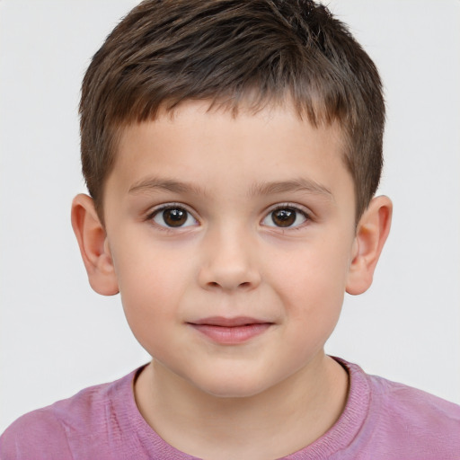 Joyful white child male with short  brown hair and brown eyes