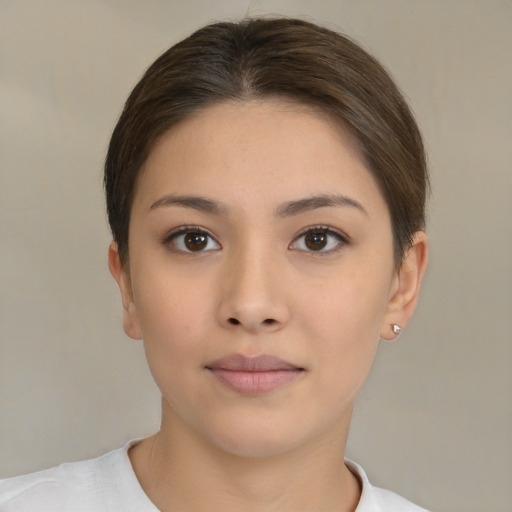 Neutral white young-adult female with short  brown hair and brown eyes