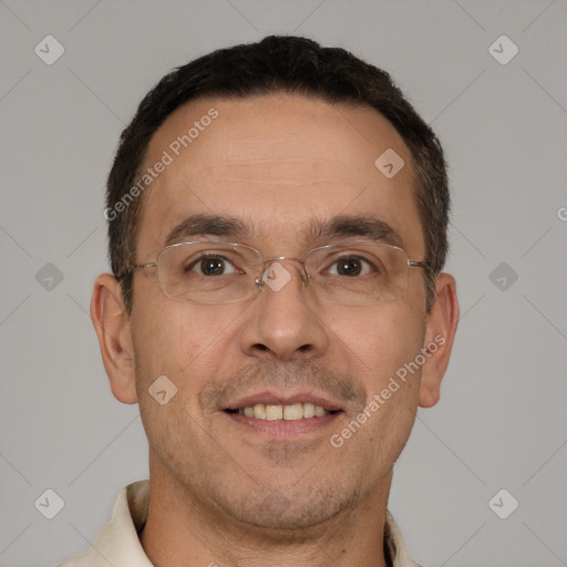 Joyful white adult male with short  brown hair and brown eyes