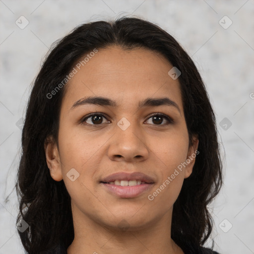 Joyful latino young-adult female with medium  brown hair and brown eyes