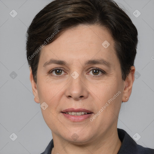 Joyful white adult female with short  brown hair and brown eyes